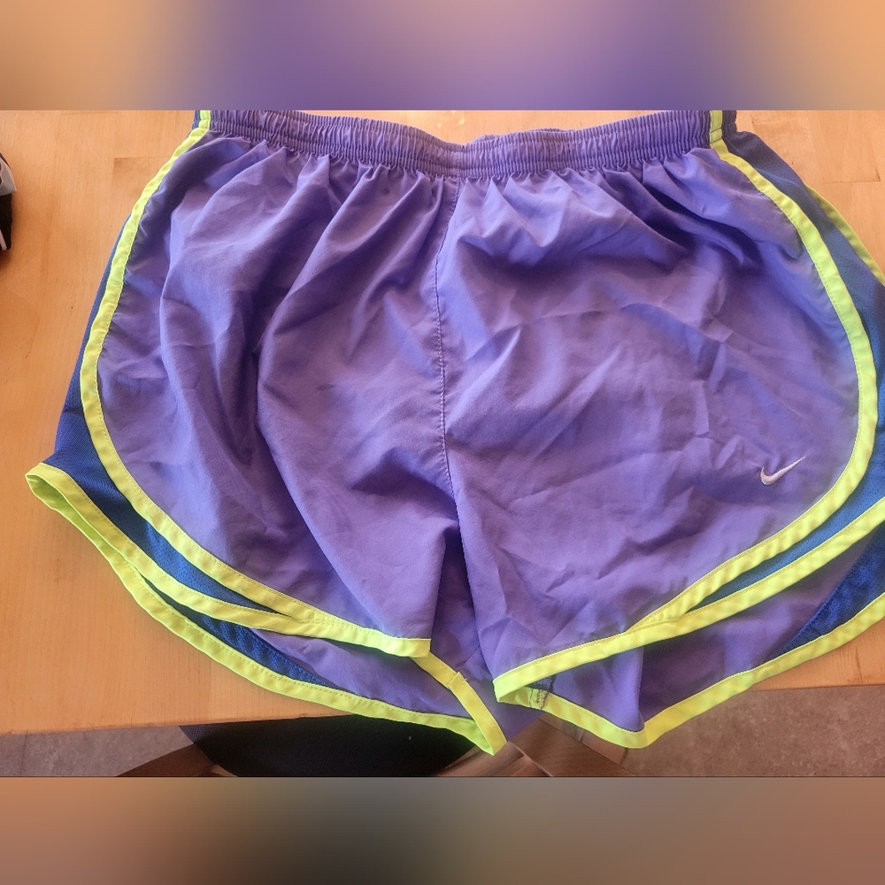 Purple and neon yellow Nike Running shorts
